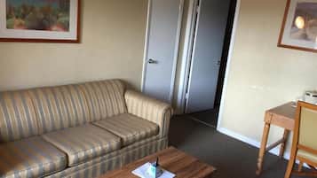 Suite, 1 King Bed, Non Smoking | Desk, iron/ironing board, free WiFi, bed sheets
