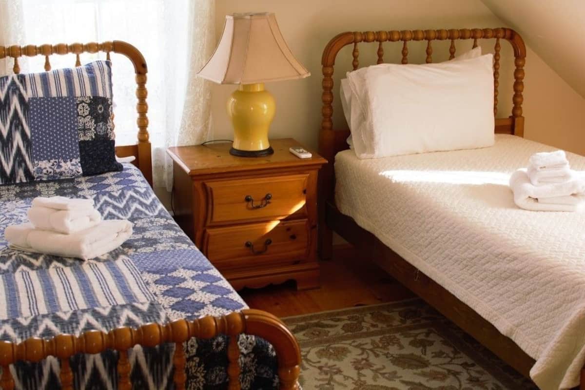 Apartamento, 2 quartos, cozinha, vista para o oceano | Ferros/tábuas de passar roupa, Wi-Fi de cortesia