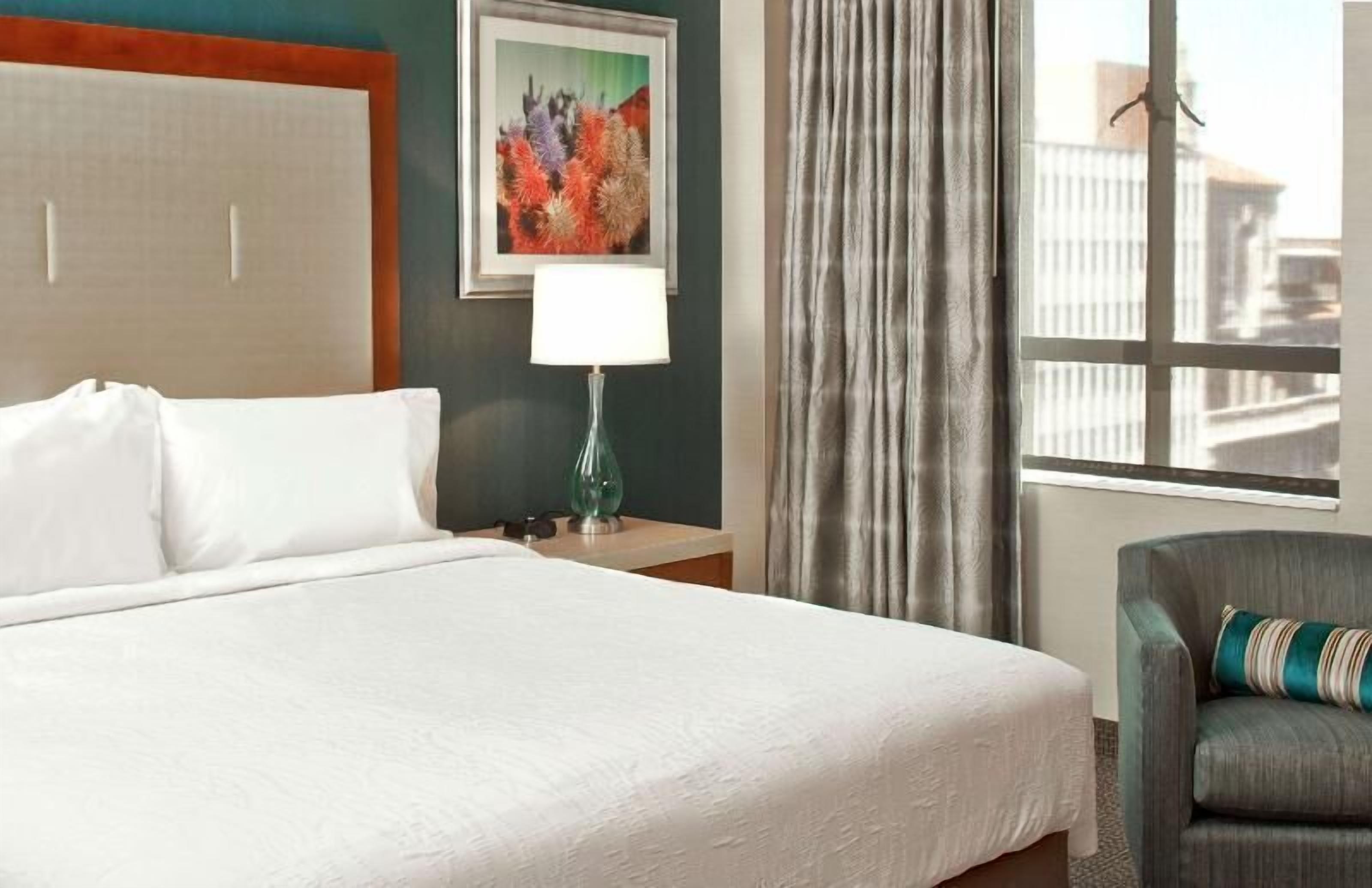 Premium bedding, pillow-top beds, desk, blackout curtains