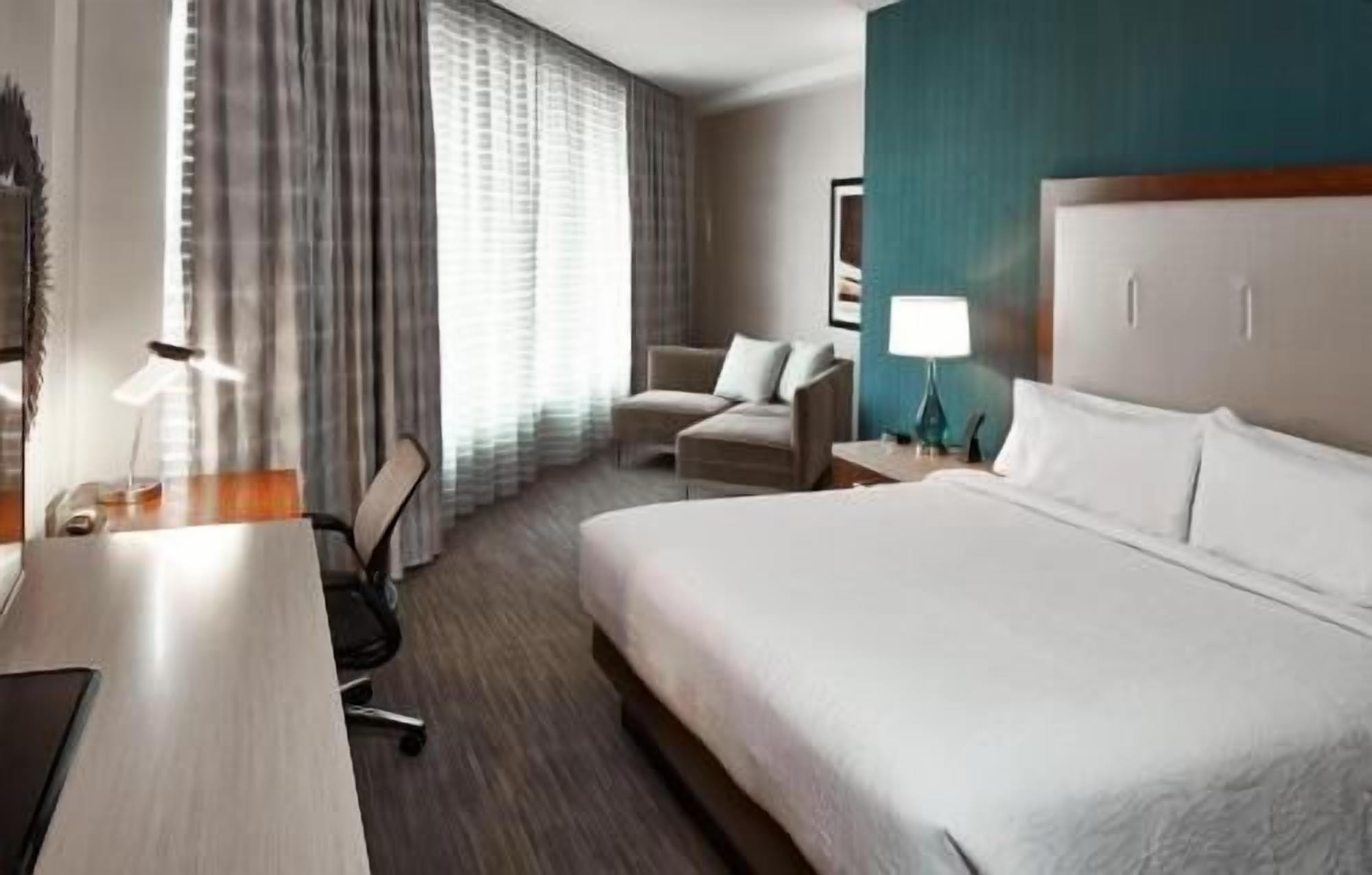 Premium bedding, pillow-top beds, desk, blackout curtains