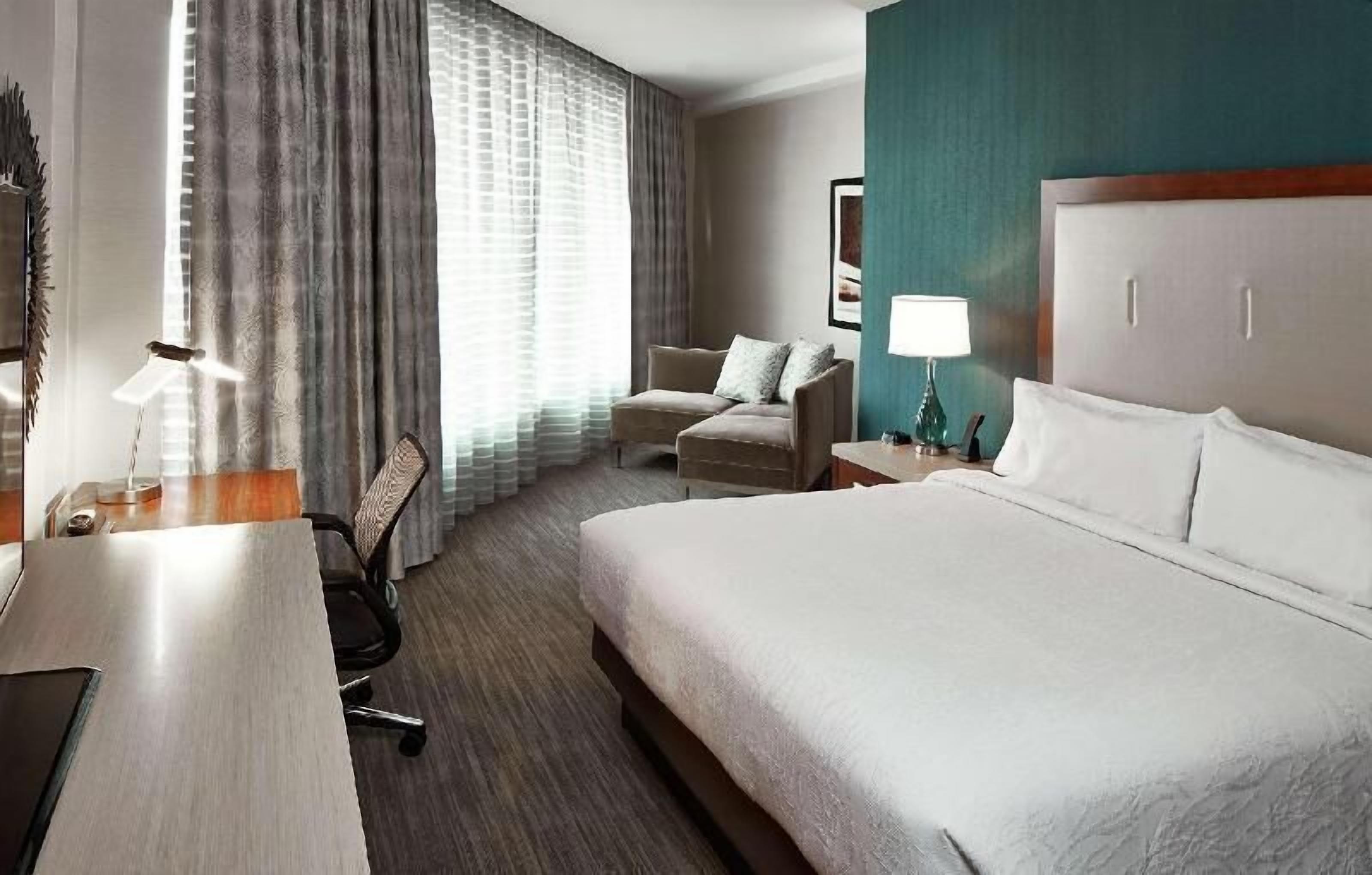 Premium bedding, pillow-top beds, desk, blackout curtains