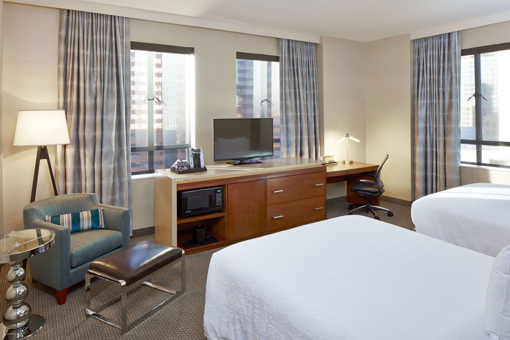 Premium bedding, pillow-top beds, desk, blackout curtains