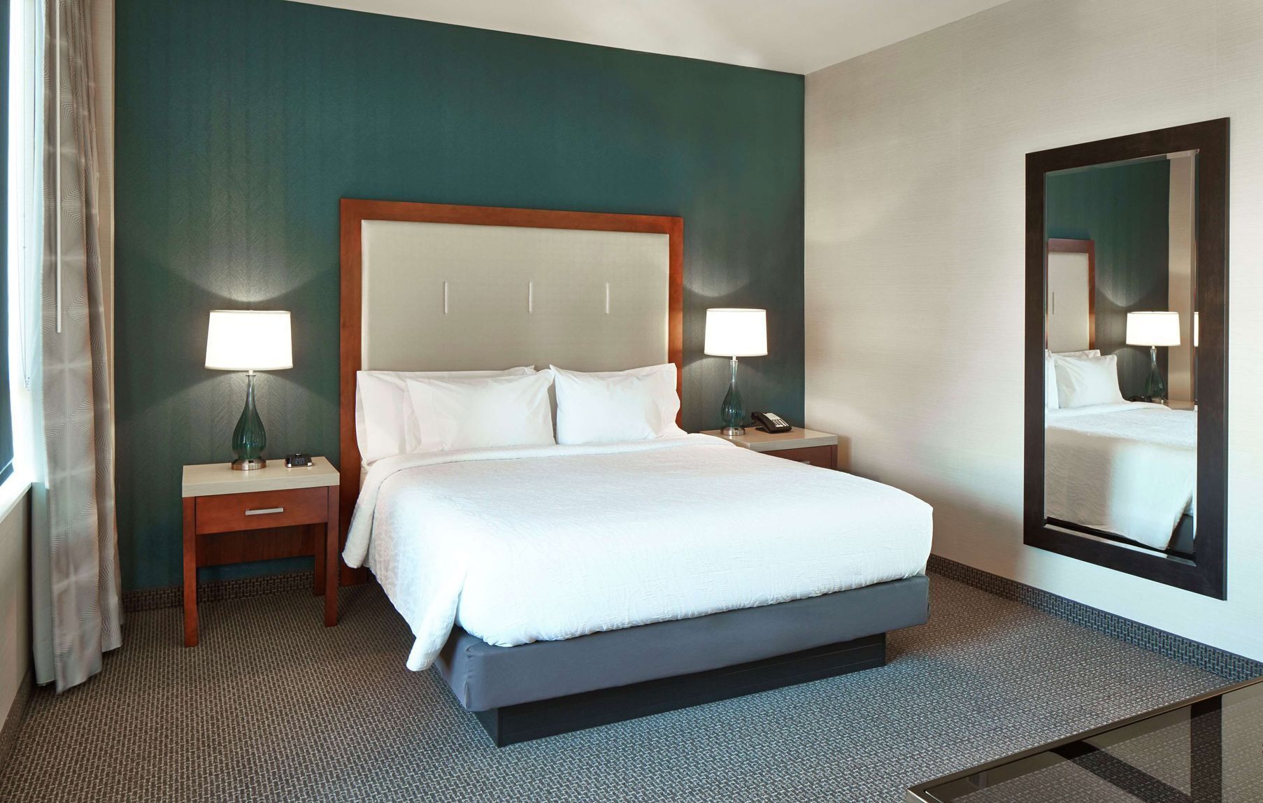 Premium bedding, pillowtop beds, desk, blackout drapes