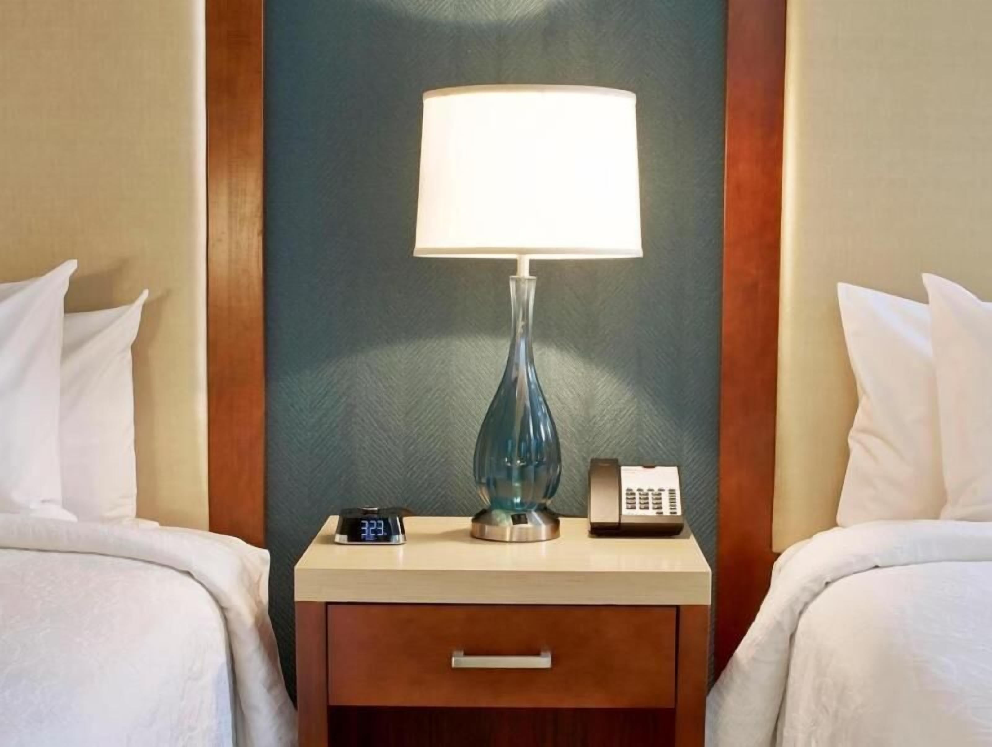 Premium bedding, pillow-top beds, desk, blackout curtains