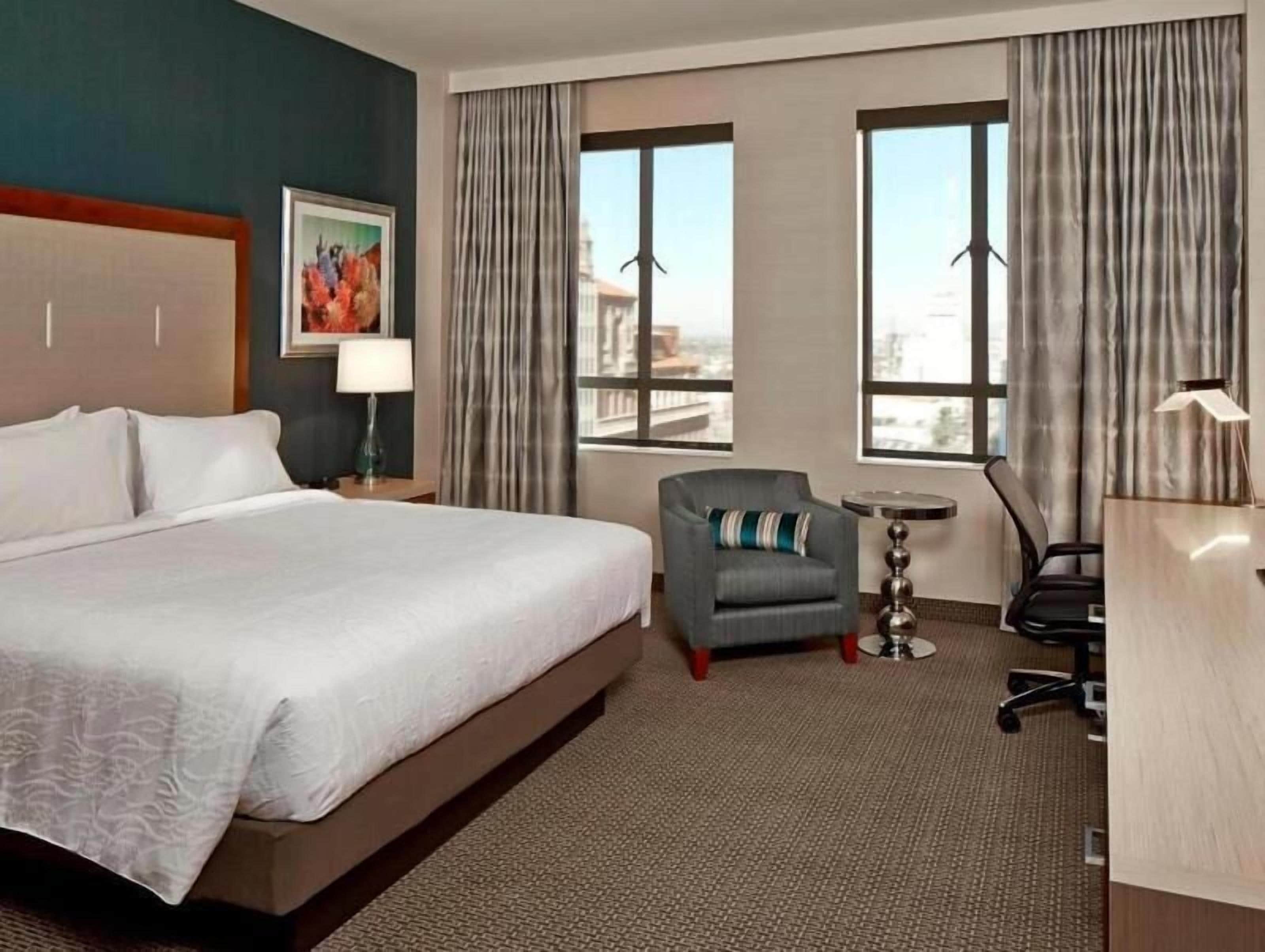 Premium bedding, pillow-top beds, desk, blackout curtains