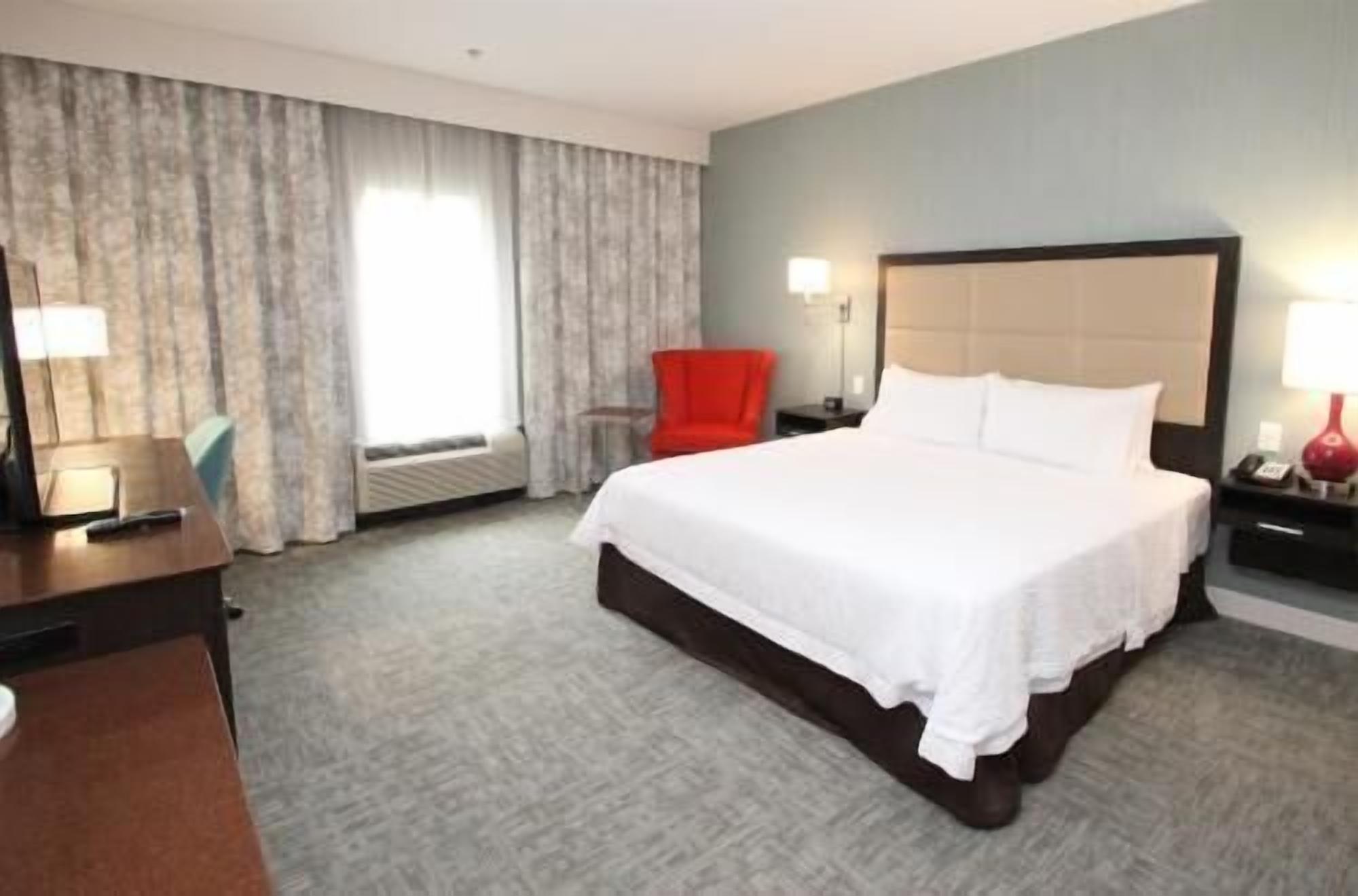 Hypo-allergenic bedding, in-room safe, desk, laptop workspace