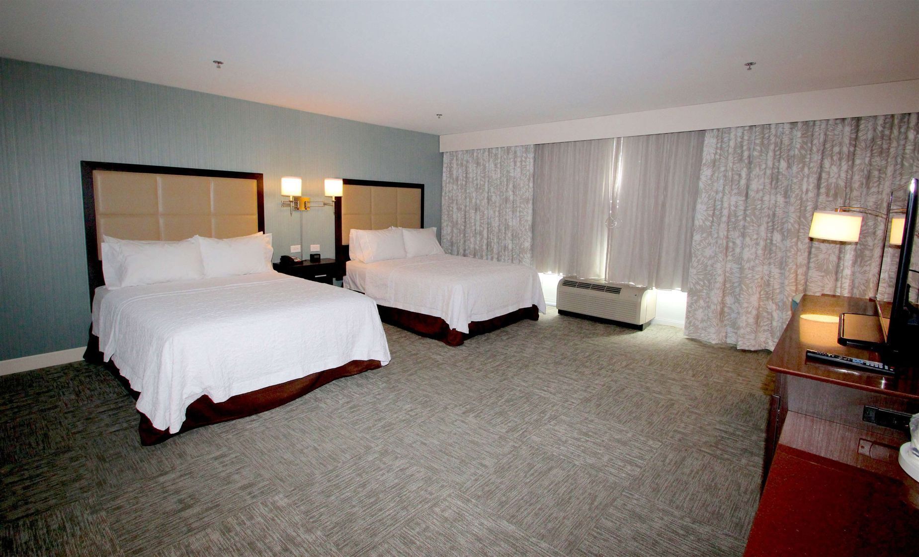 Hypo-allergenic bedding, in-room safe, desk, laptop workspace