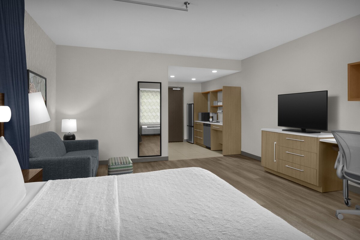 Premium bedding, pillow-top beds, desk, laptop workspace