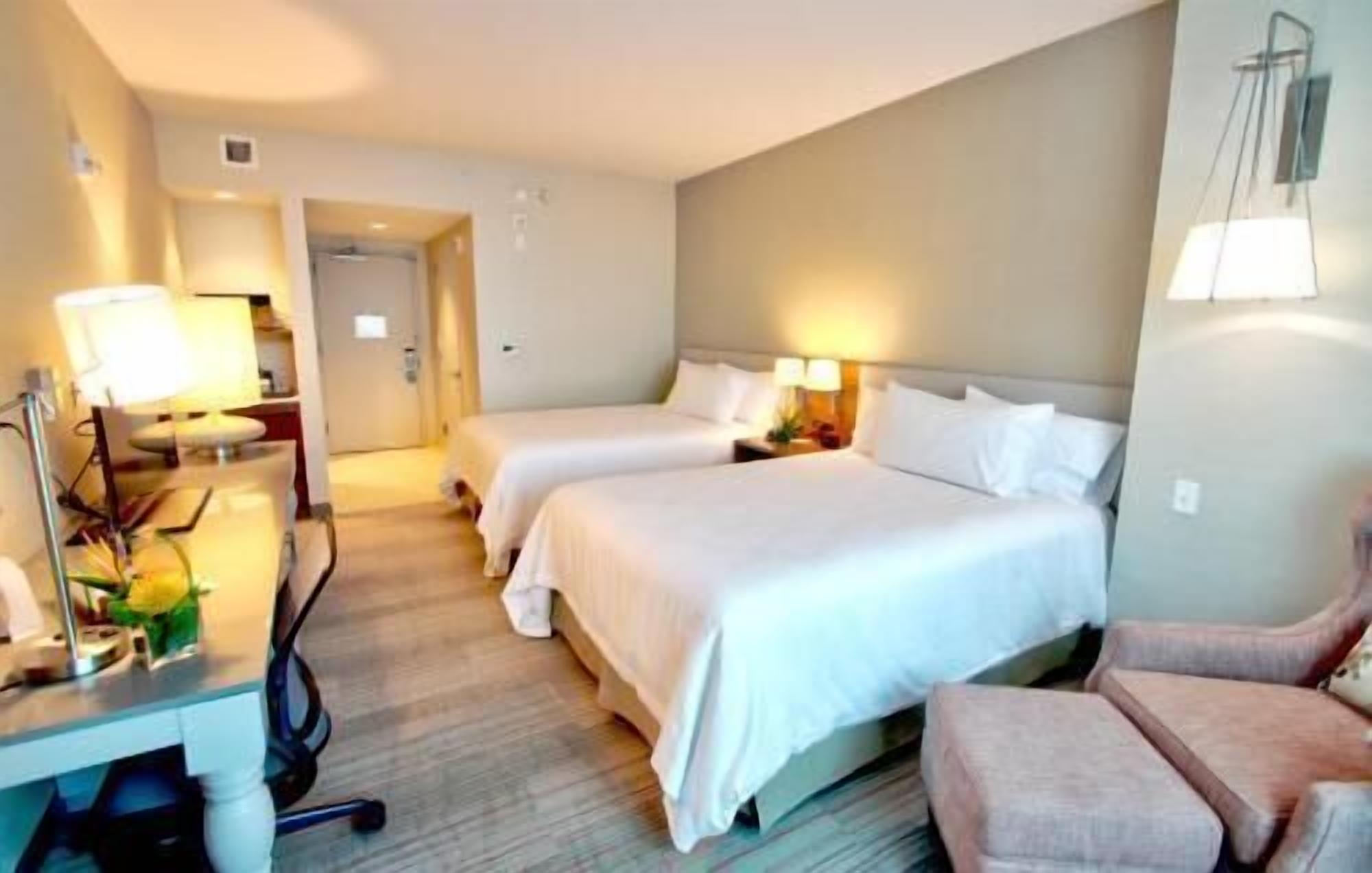 Hypo-allergenic bedding, in-room safe, desk, laptop workspace