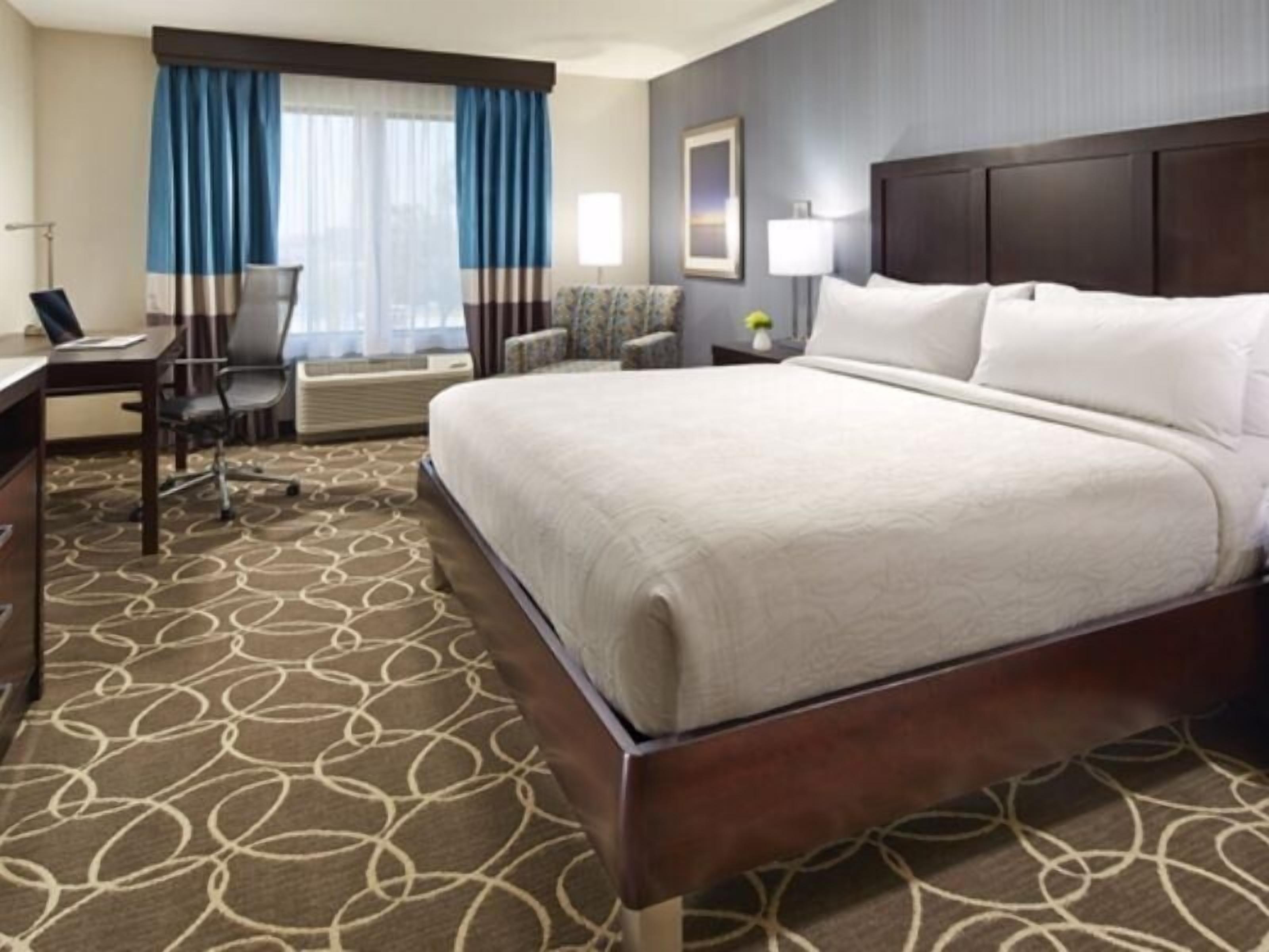 Hypo-allergenic bedding, in-room safe, desk, laptop workspace