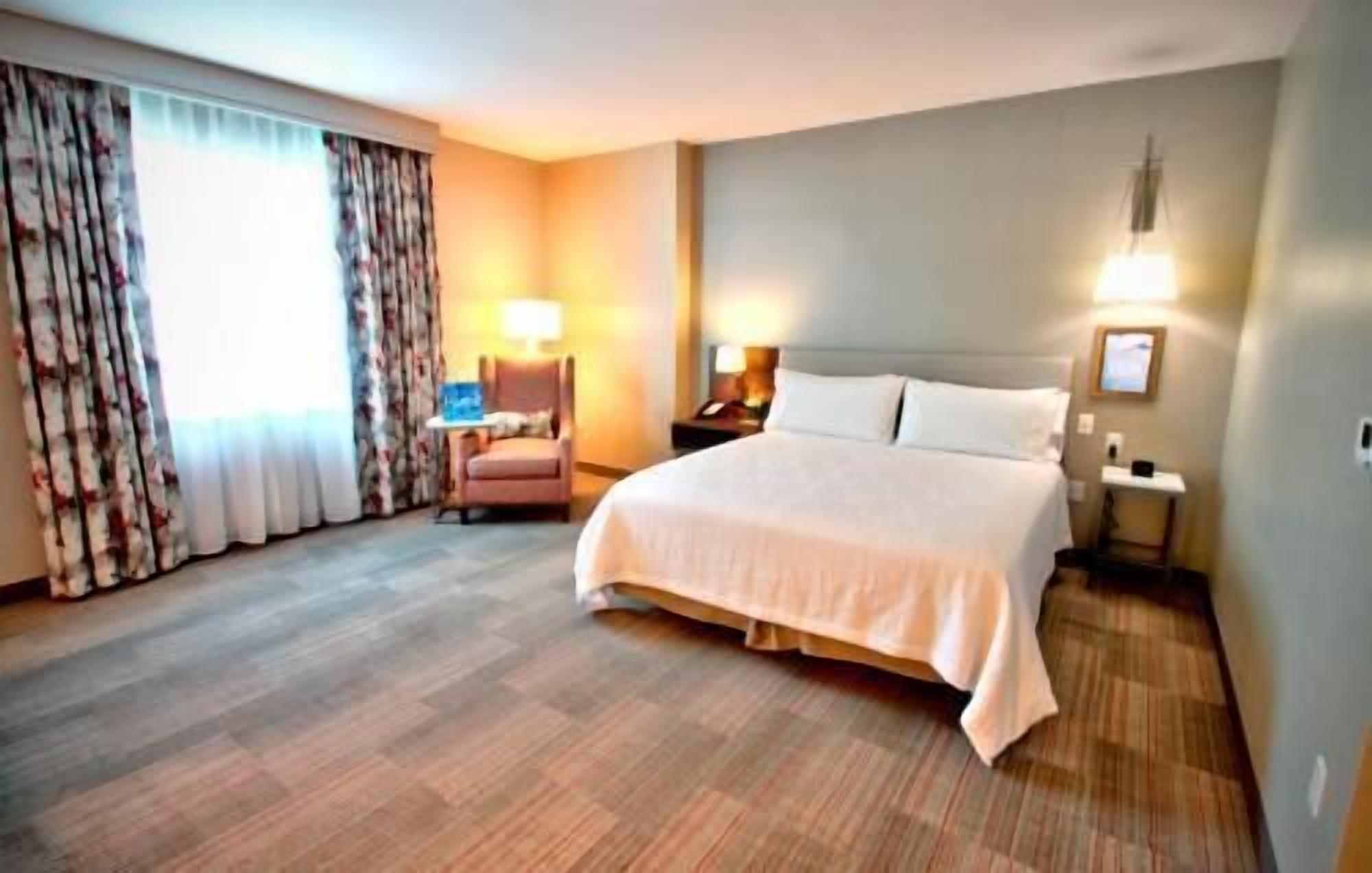 Hypo-allergenic bedding, in-room safe, desk, laptop workspace