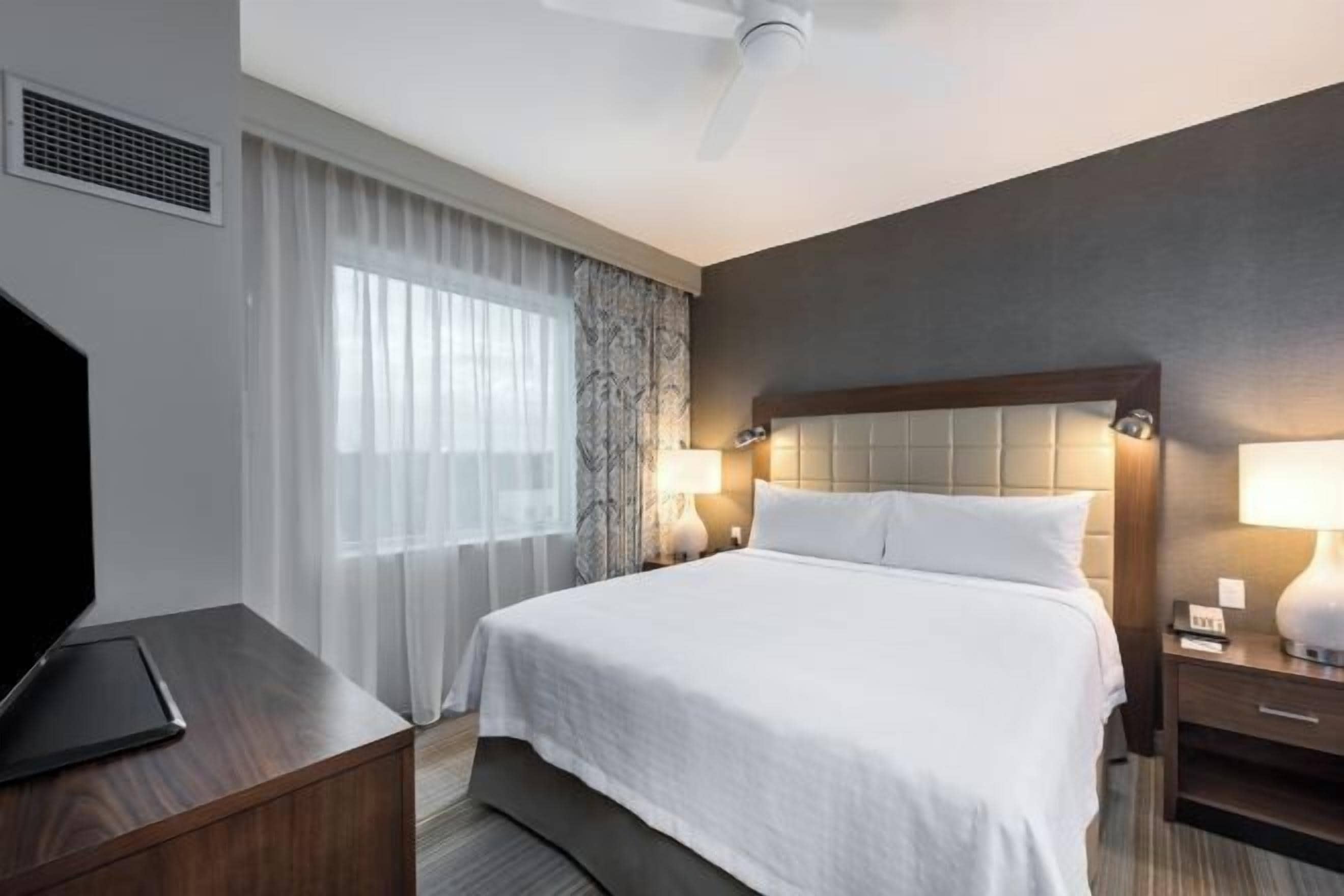 Hypo-allergenic bedding, down duvets, pillow-top beds, in-room safe