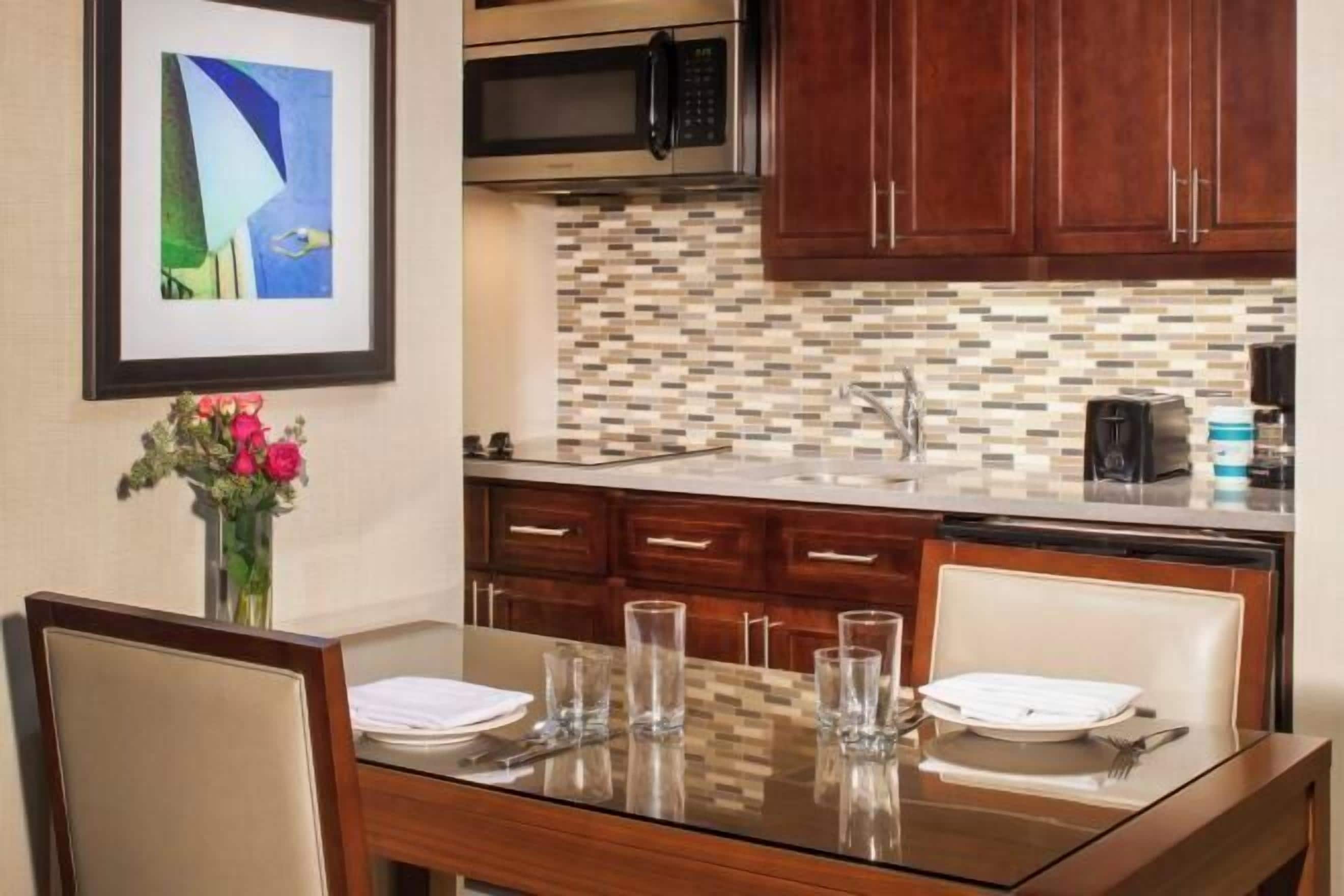 Full-sized fridge, microwave, stovetop, dishwasher