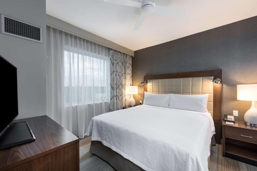 Hypo-allergenic bedding, down duvets, pillow-top beds, in-room safe