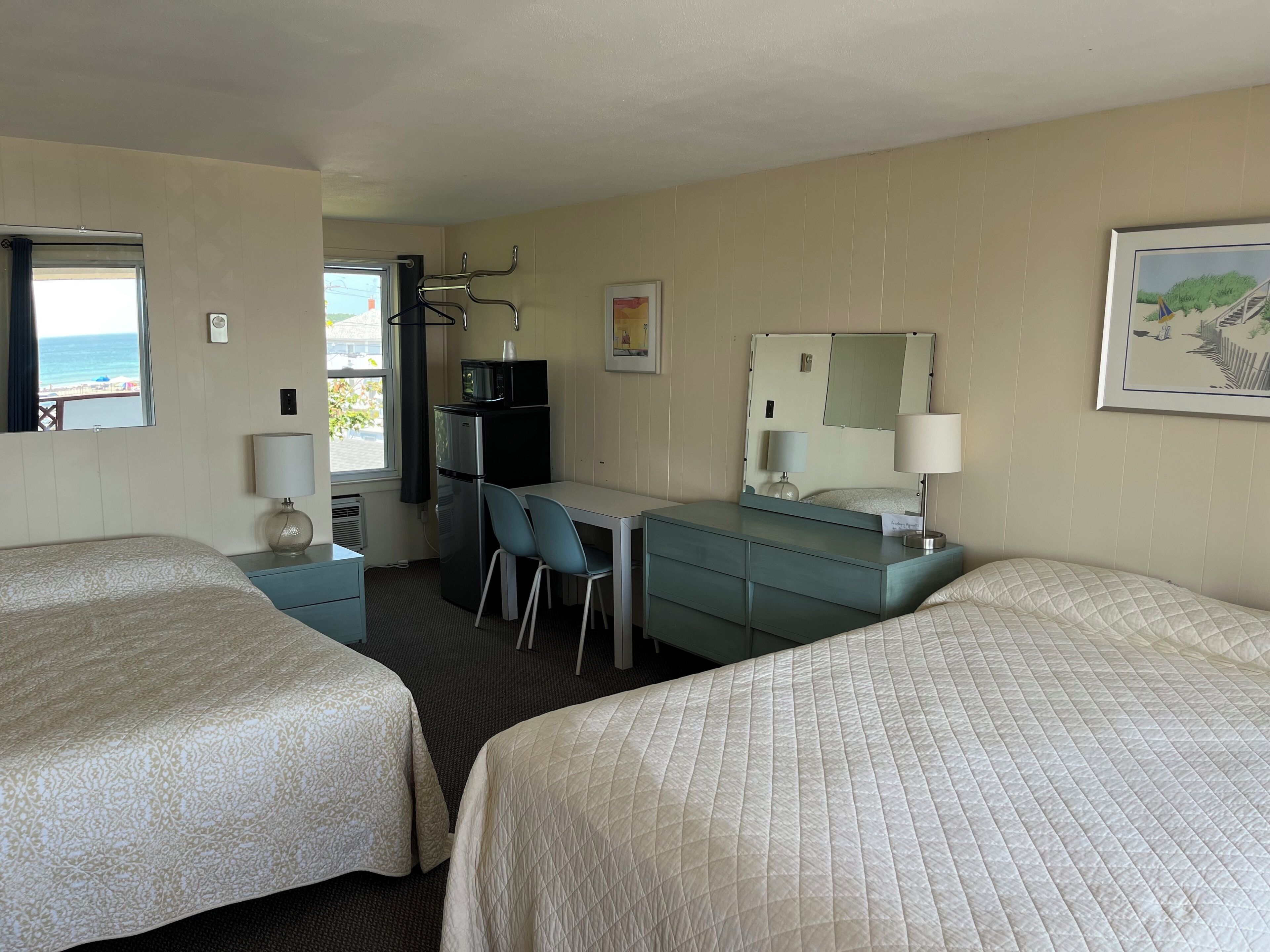 Room, 1 Queen and 1 Double Bed | Individually decorated, individually furnished, free WiFi, bed sheets