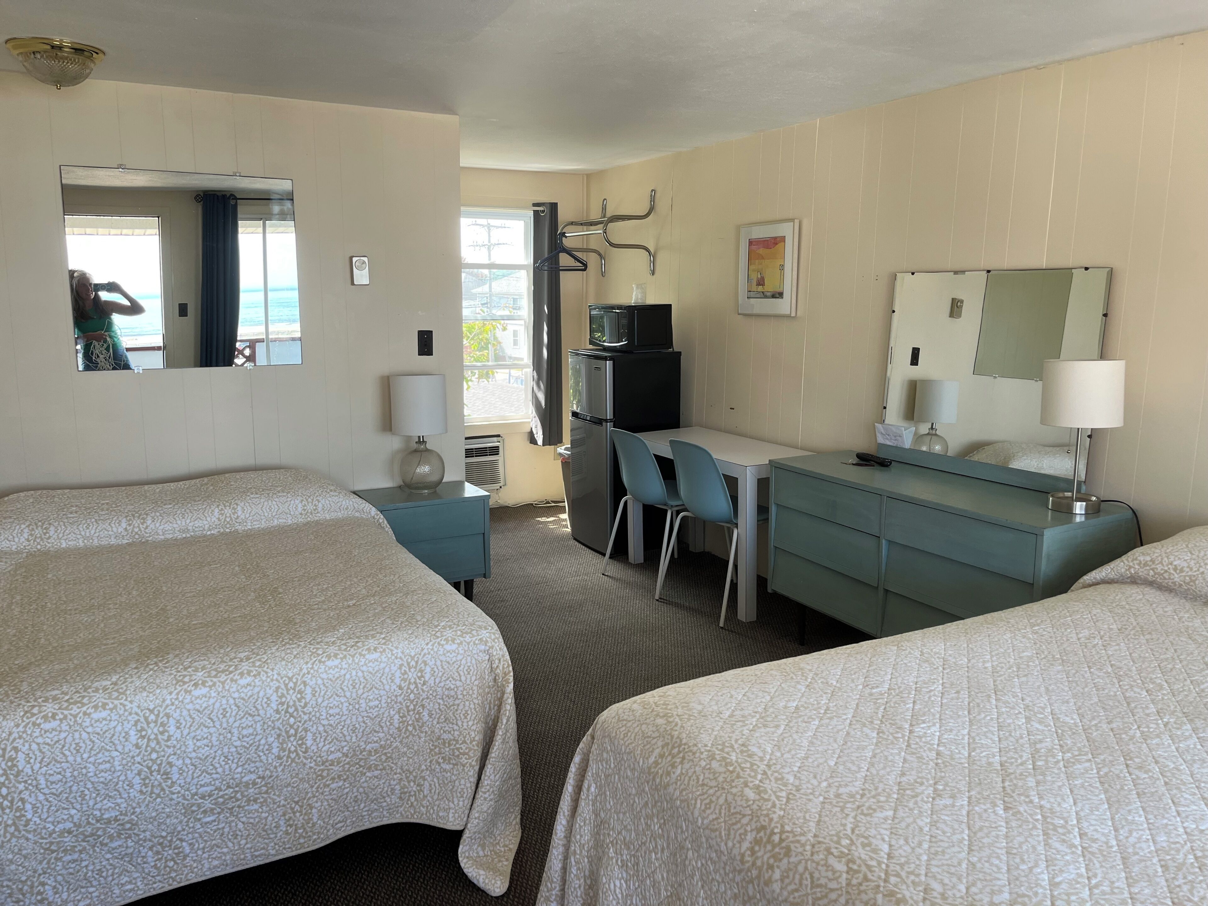 Room, 1 Queen and 1 Double Bed | Individually decorated, individually furnished, free WiFi, bed sheets