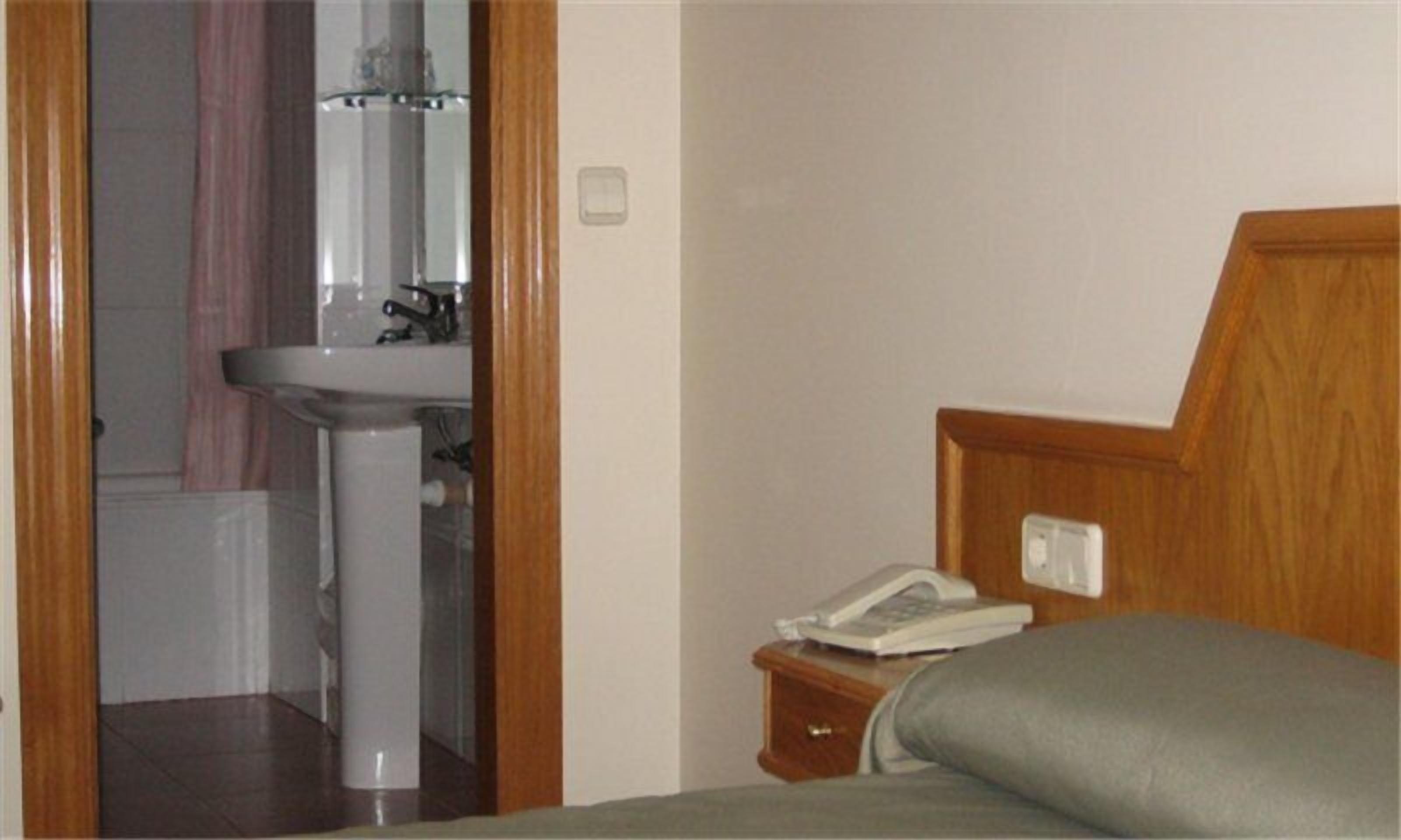 desk, blackout curtains, iron/ironing board, free wifi