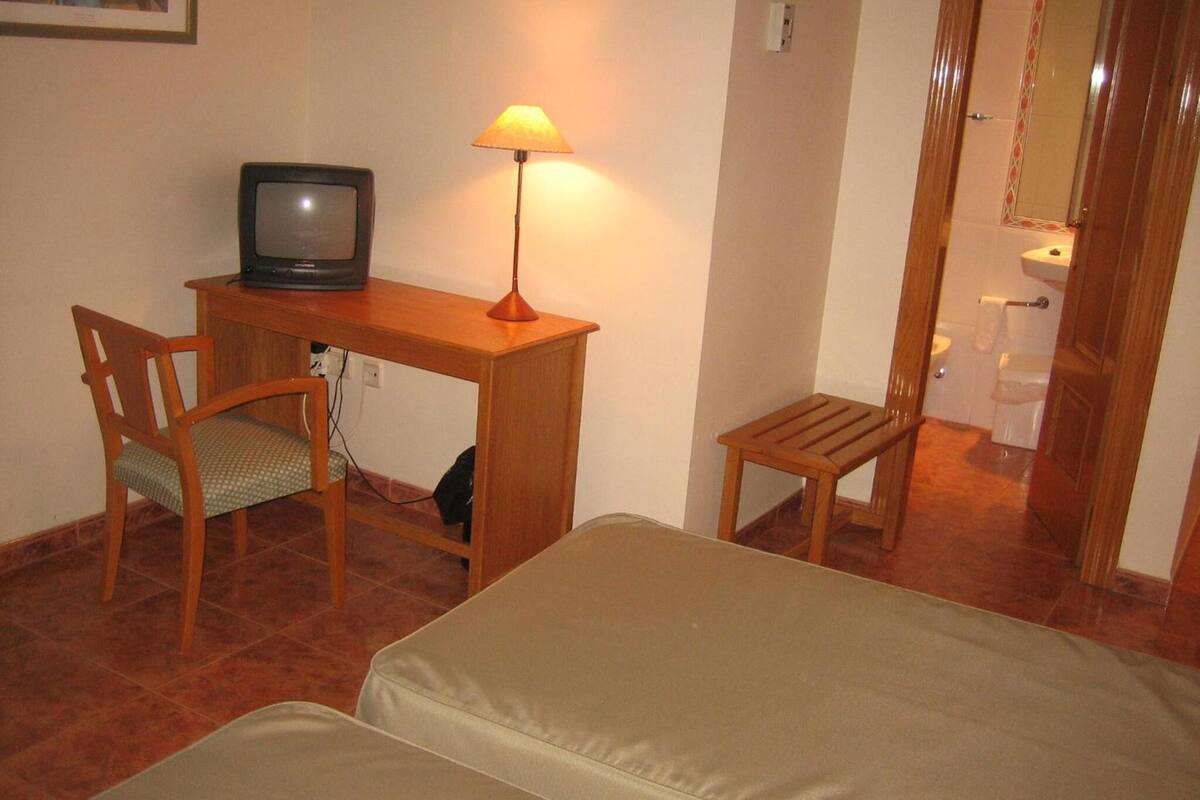 desk, blackout curtains, iron/ironing board, free wifi