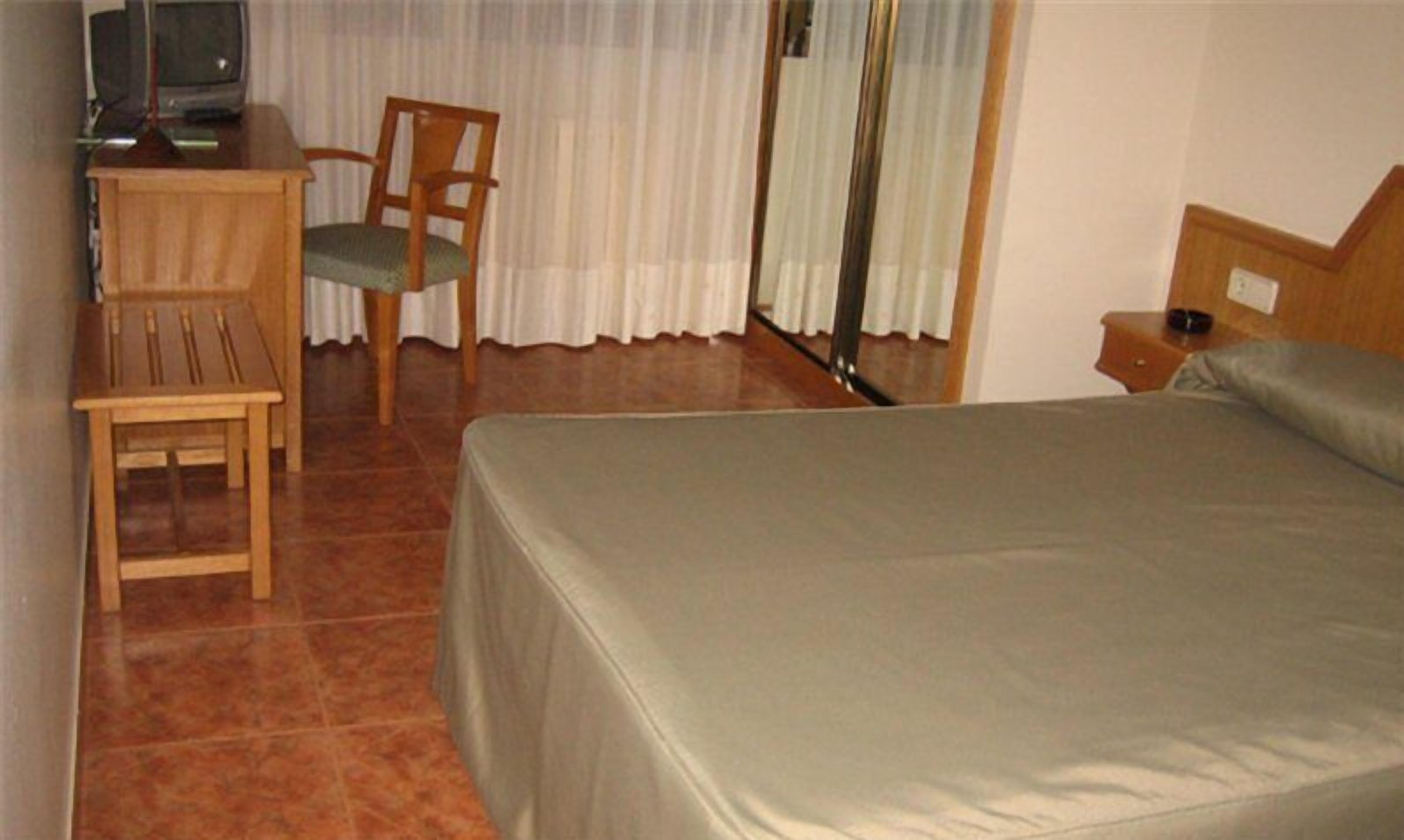 desk, blackout curtains, iron/ironing board, free wifi