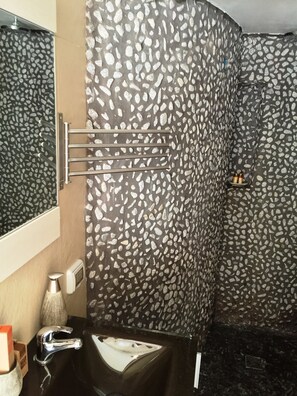 Shower, free toiletries, hair dryer, slippers