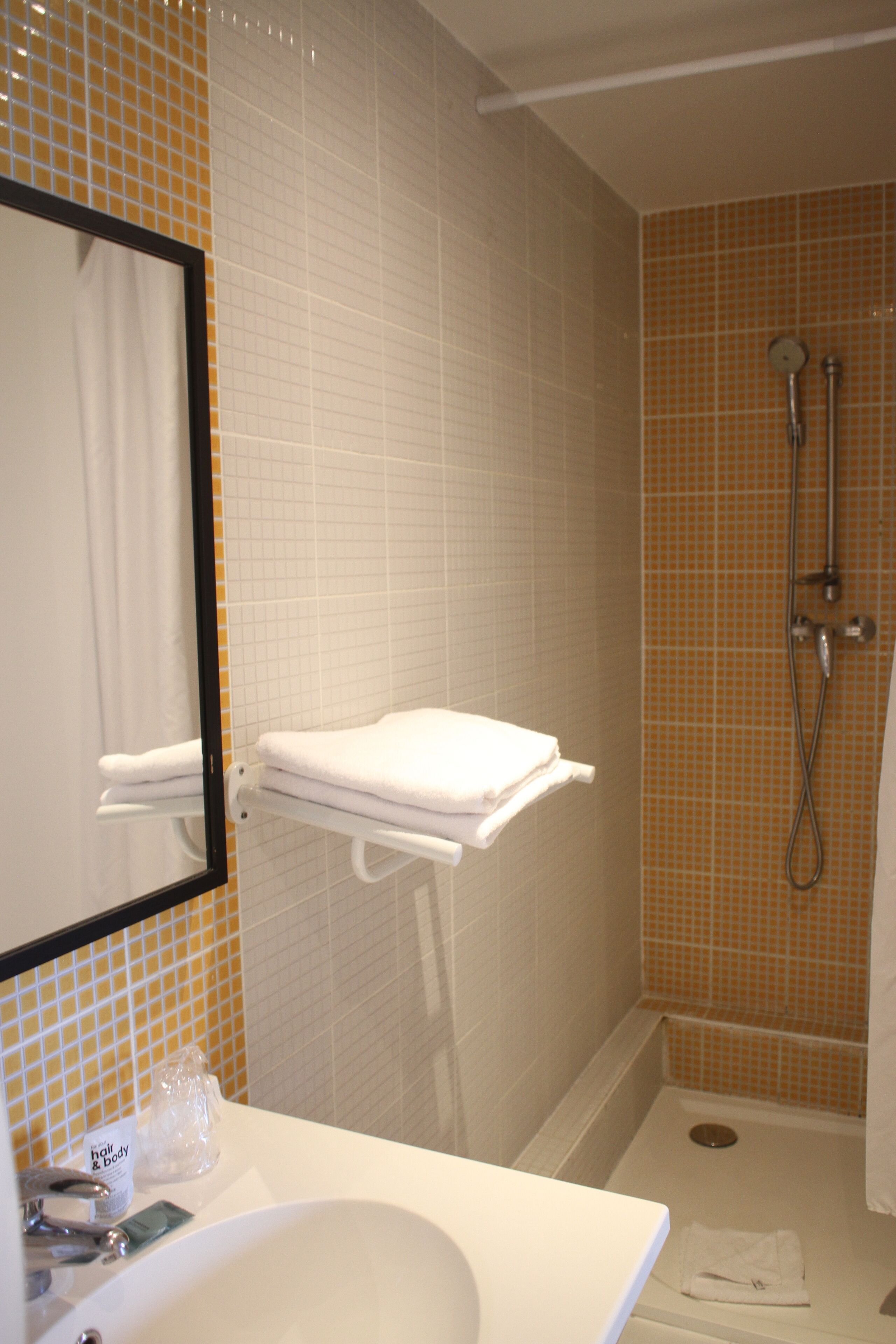 twin room | bathroom | shower, free toiletries, hair dryer, towels