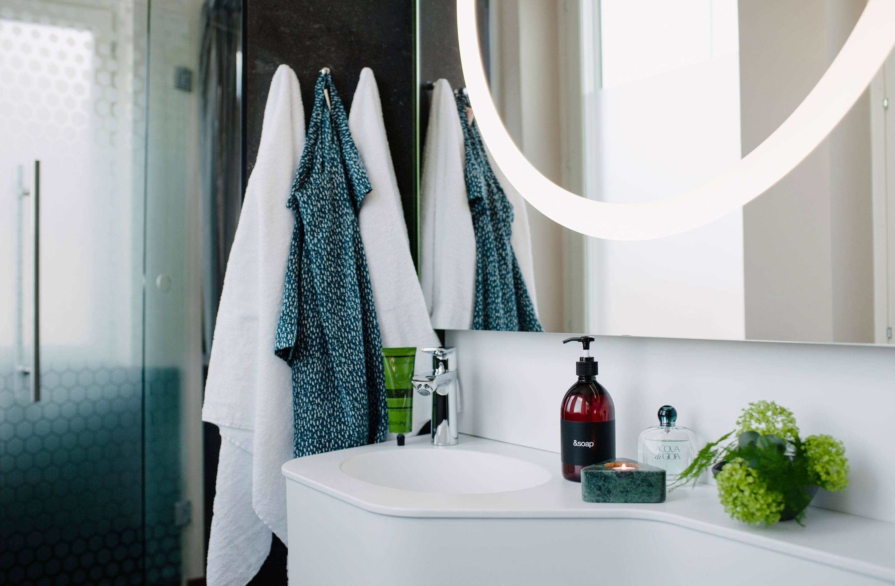 shower, rainfall showerhead, hair dryer, towels