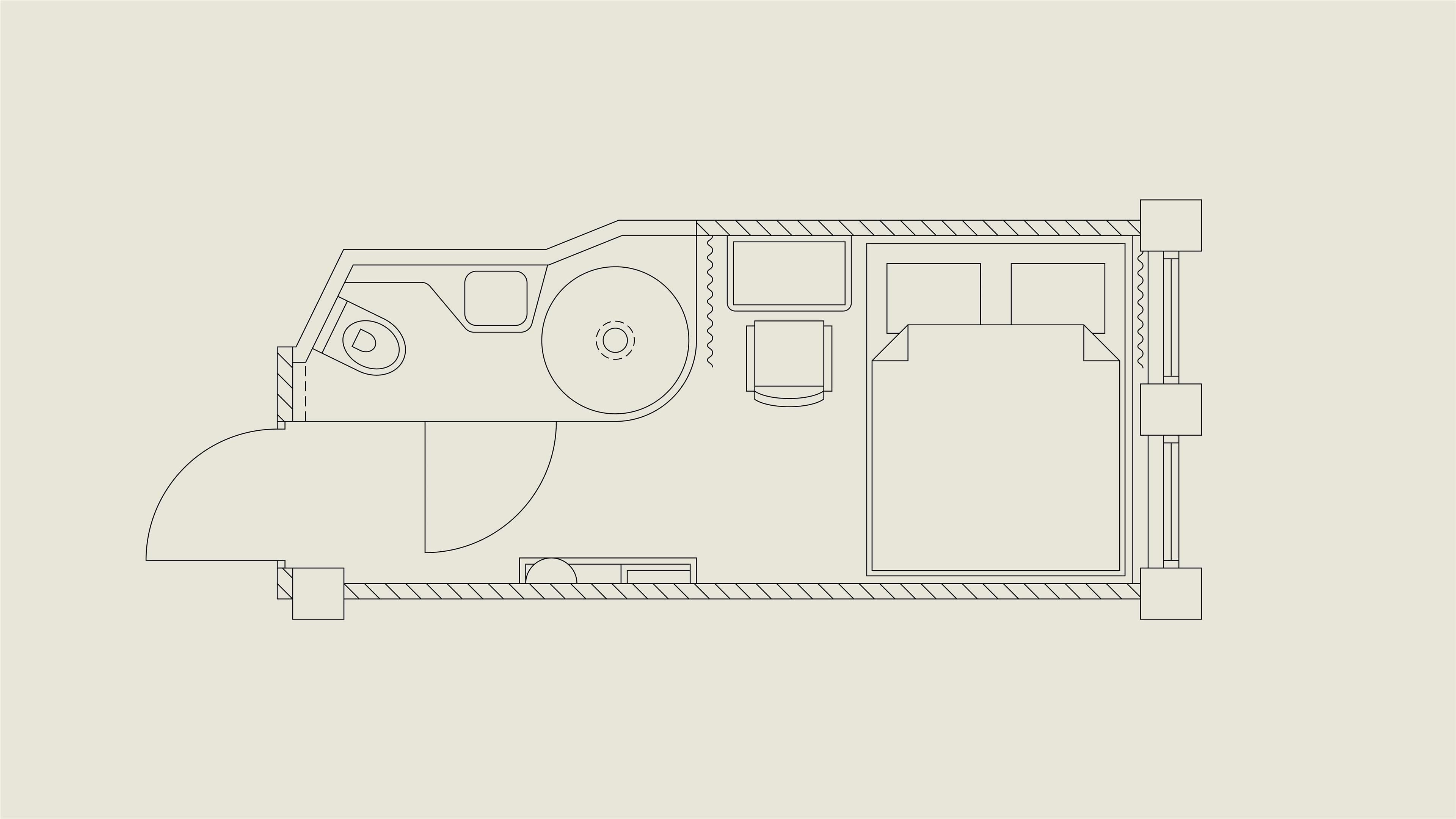 A floor plan of a building with a large central room, smaller rooms on either side, and a staircase leading to an upper level.