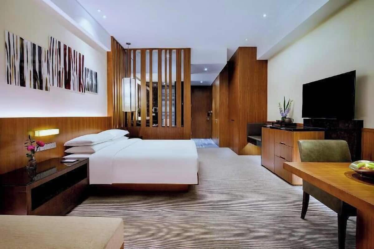 Premium bedding, down comforters, memory foam beds, minibar