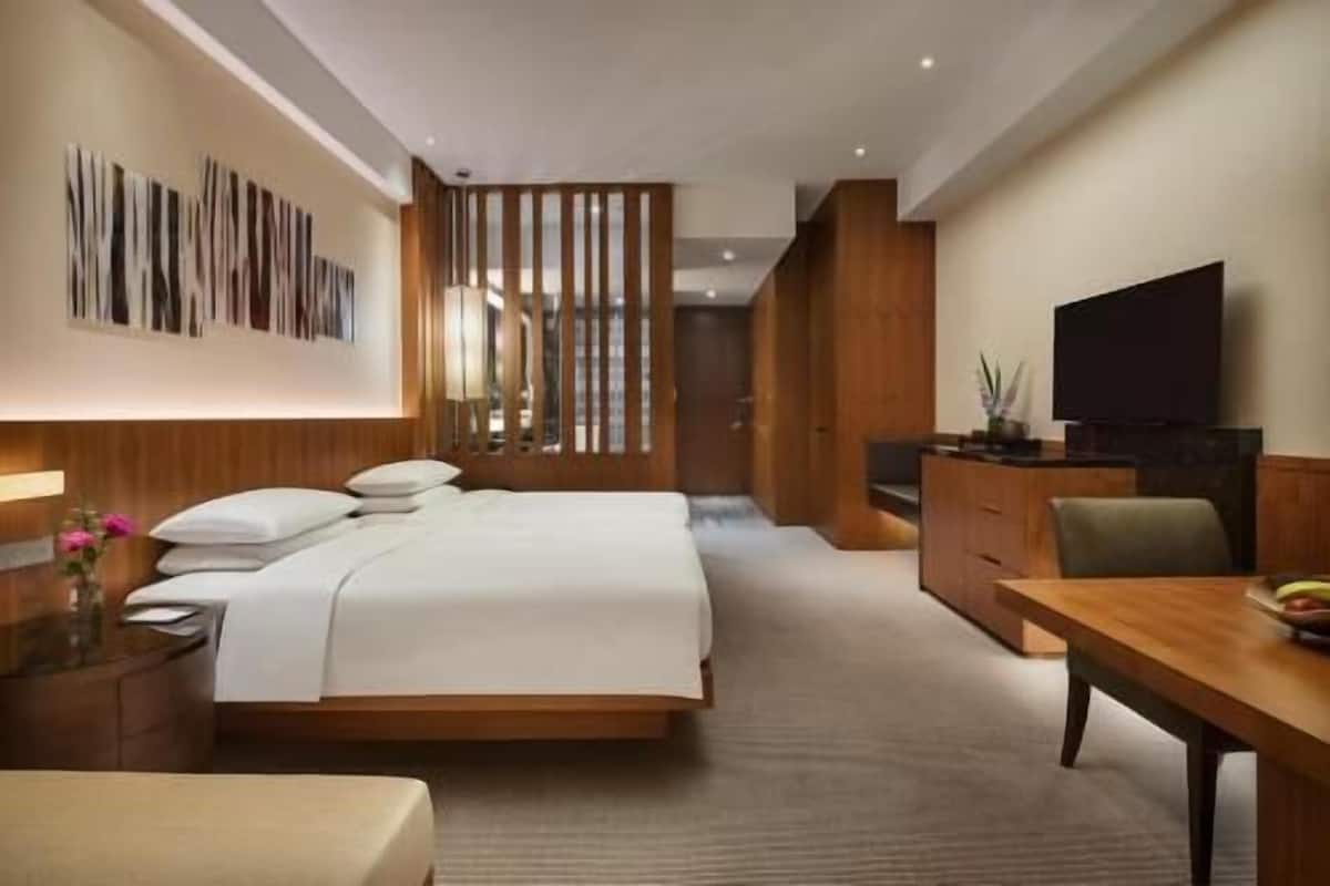 Premium bedding, down comforters, memory foam beds, minibar