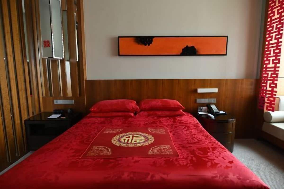 Premium bedding, down duvets, memory-foam beds, minibar