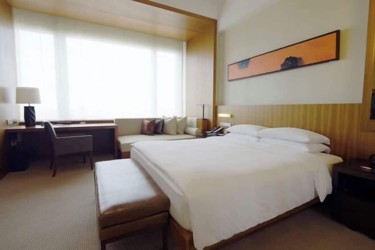 Premium bedding, down duvets, memory-foam beds, minibar