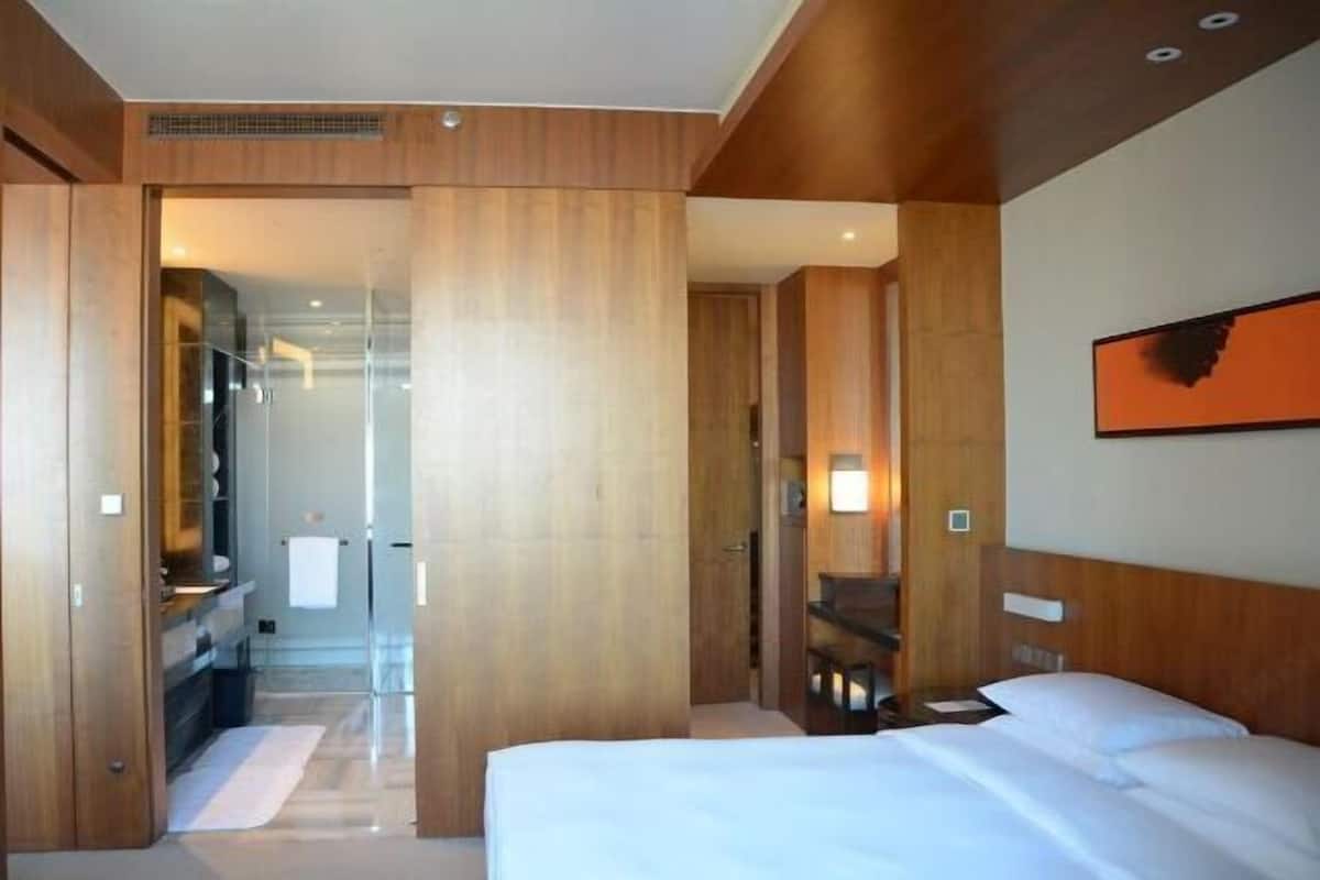 Premium bedding, down duvets, memory-foam beds, minibar