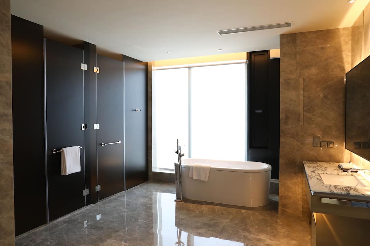 suite (chairman) | bathroom | separate bathtub and shower, rainfall showerhead, designer toiletries