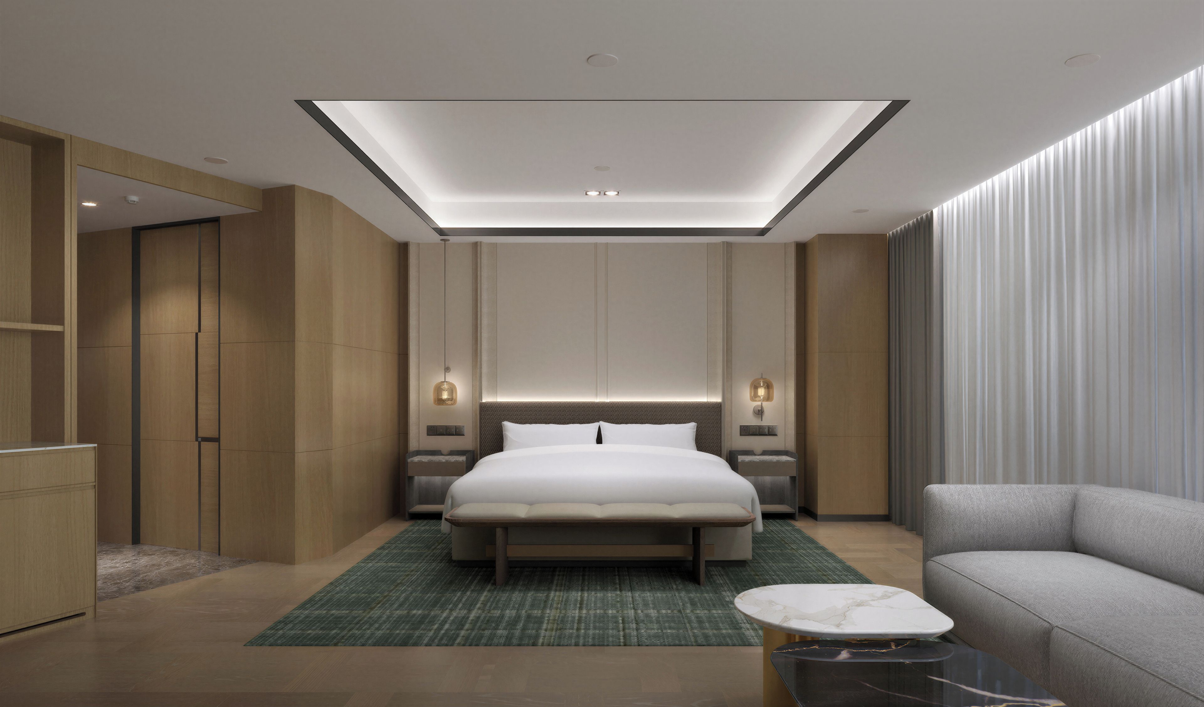 A modern hotel room with a large bed, bedside tables, a sofa, a small table, and a ceiling skylight.
