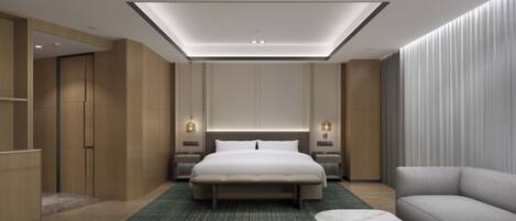 A modern hotel room with a large bed, bedside tables, a sofa, a small table, and a ceiling skylight.
