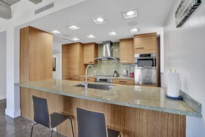 Premium Apartment, 2 Bedrooms, 2 Bathrooms, Beach View | Private kitchen | Full-size fridge, microwave, stovetop, dishwasher - Netherland Apartments by Royal Stays (Miami Beach)