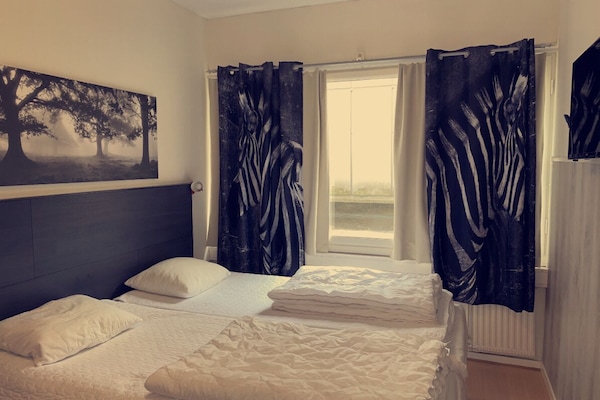 Basic Twin Room, Shared Bathroom | Desk, iron/ironing board, free WiFi, bed sheets
