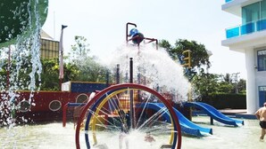 A water play area with a slide and a climbing structure. - My Resort HuaHin E503 (Hua Hin)