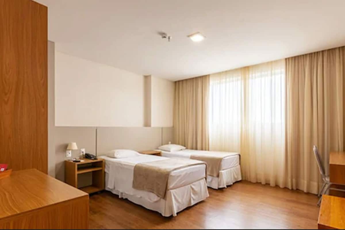 Deluxe Twin Room, 2 Twin Beds | Minibar, desk, blackout drapes, free WiFi