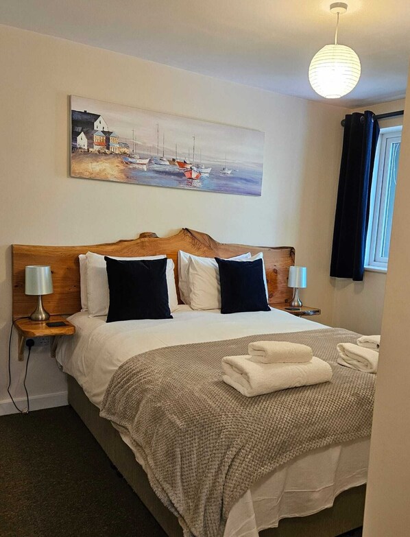 Apartemen Standar (Garden Apartment) | 1 kamar tidur, seprai premium, dan didekorasi berbeda-beda