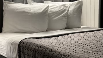 Premium bedding, desk, iron/ironing board, free WiFi