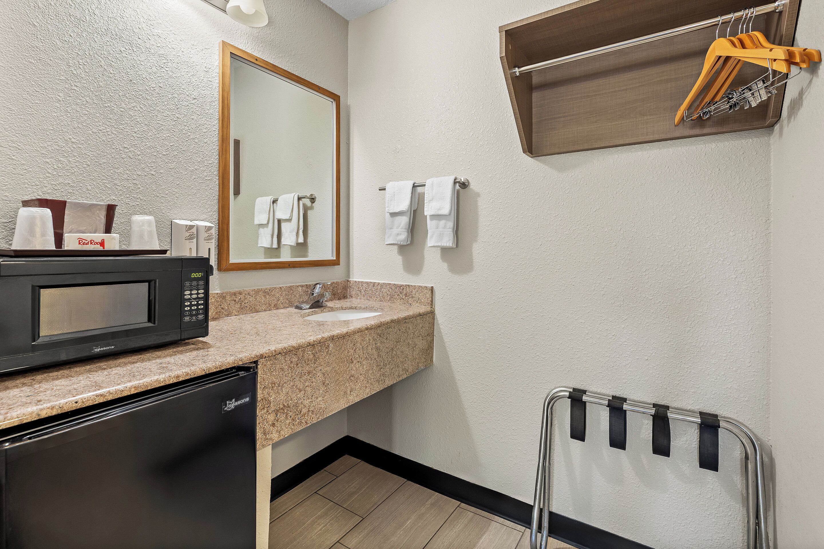 Desk, blackout drapes, bed sheets