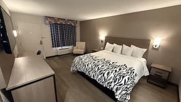 Desk, blackout drapes, bed sheets