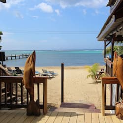 On the beach, sun loungers, beach umbrellas, beach towels