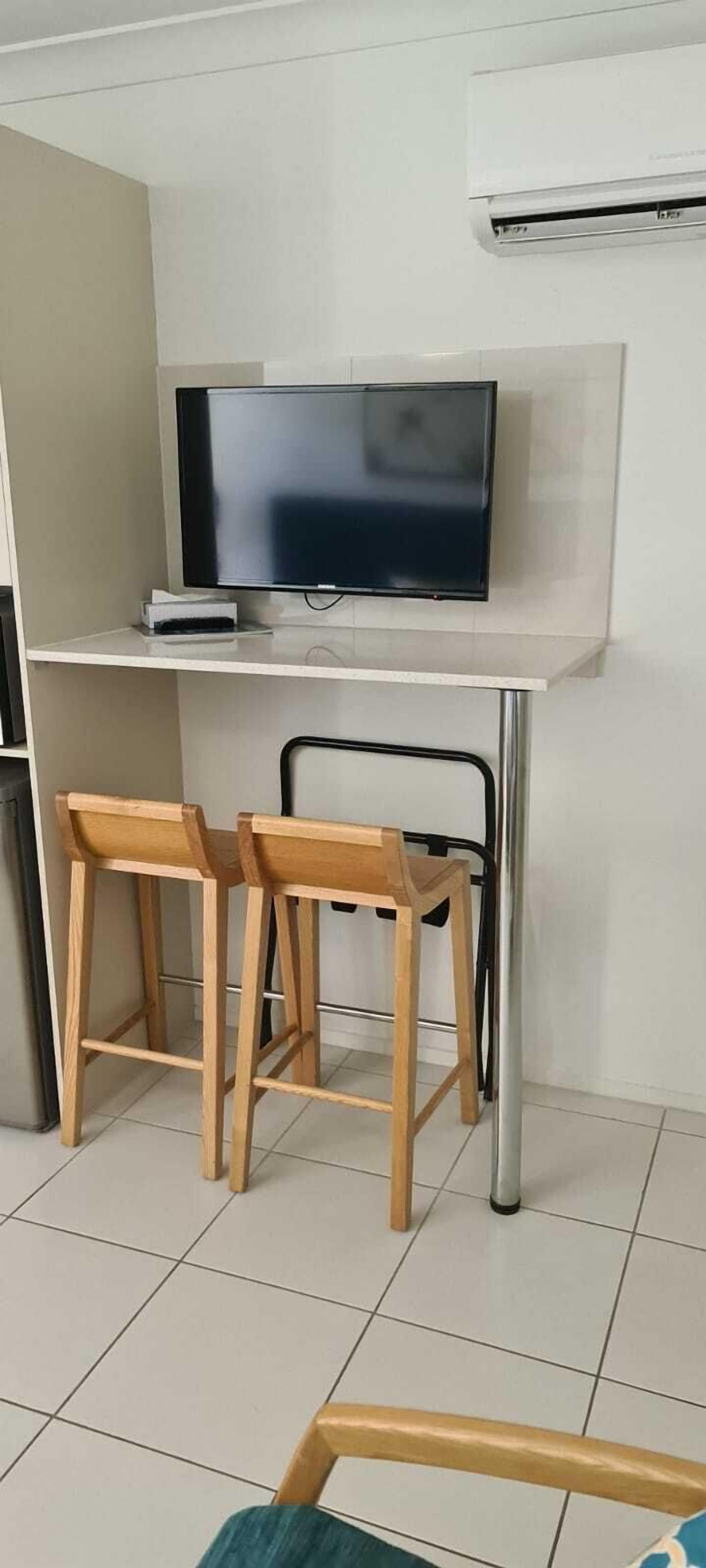 studio - no view | living area | 32-inch flat-screen tv with cable channels, tv, ipod dock