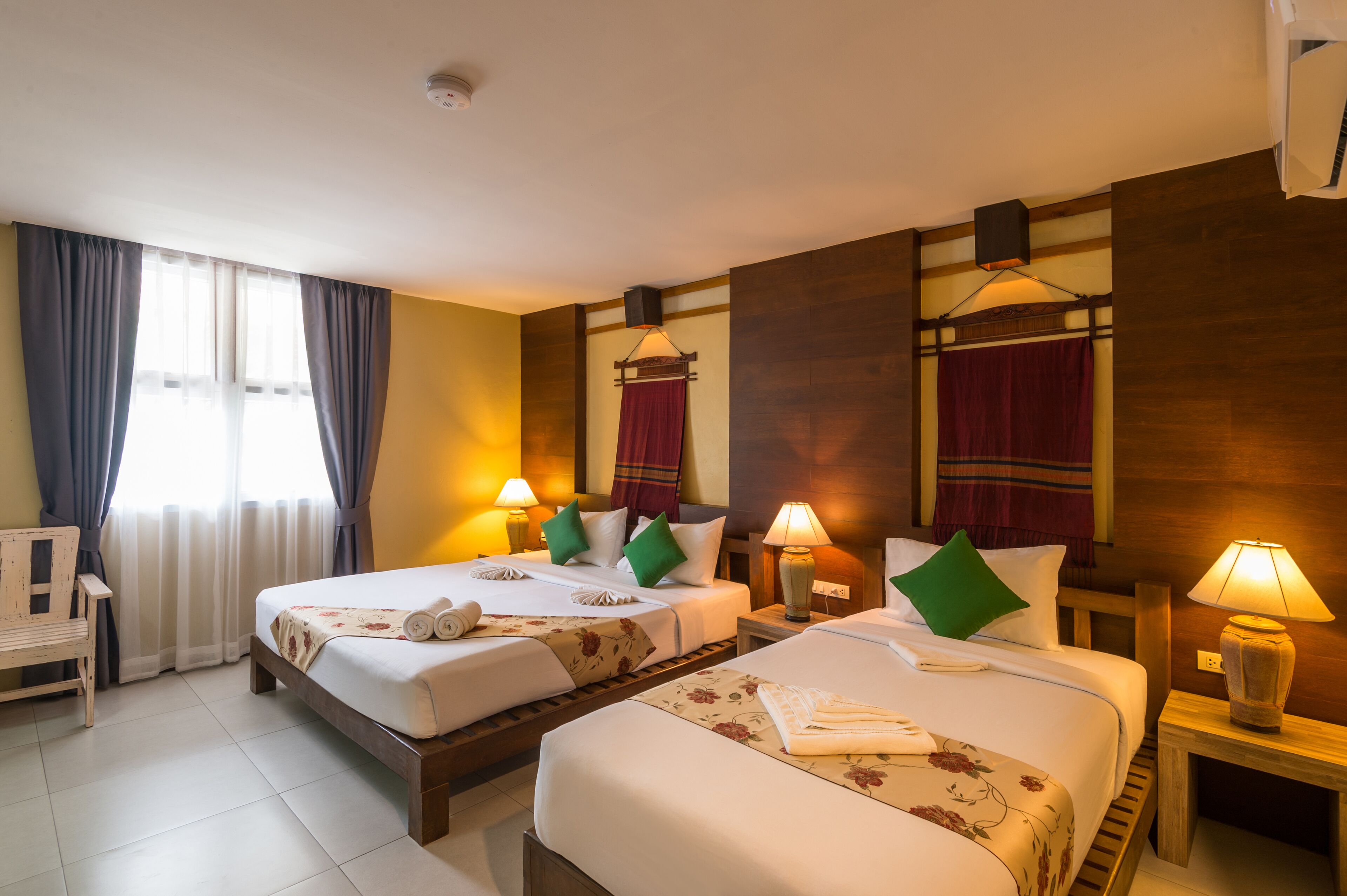 family room | 1 bedroom, free minibar, in-room safe, desk