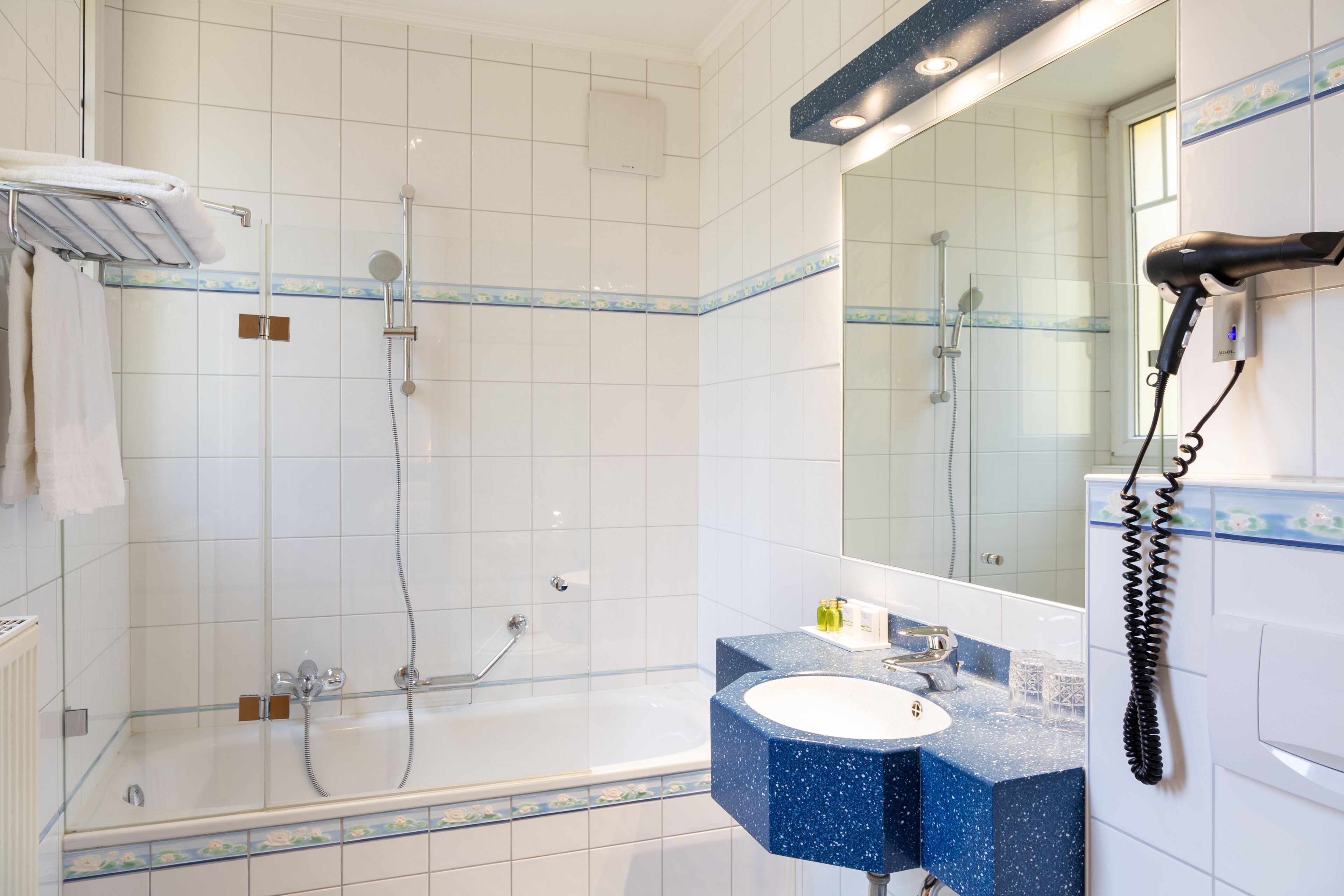superior twin room | bathroom | free toiletries, hair dryer, towels