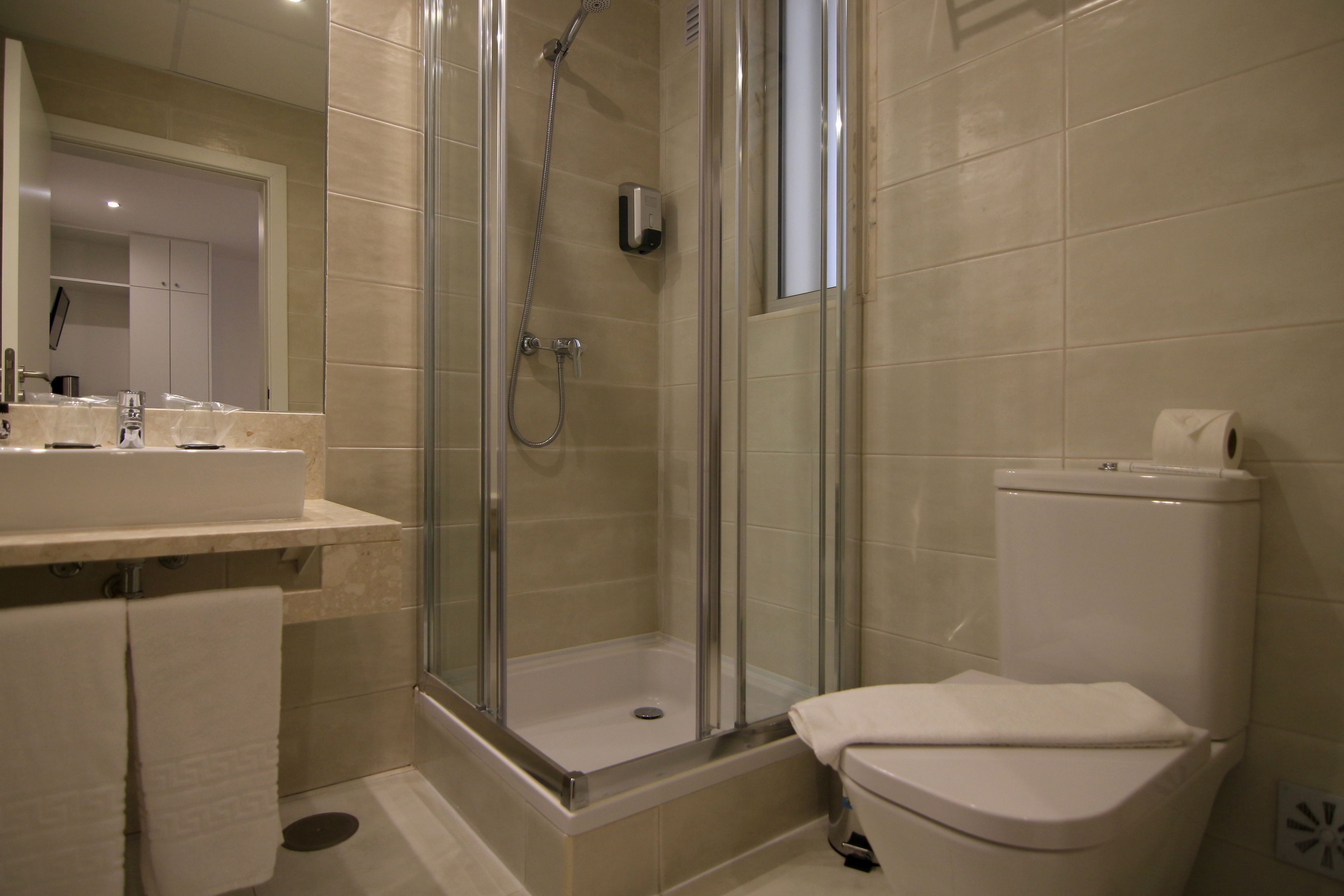 double room without kitchenette | bathroom | free toiletries, hair dryer, towels