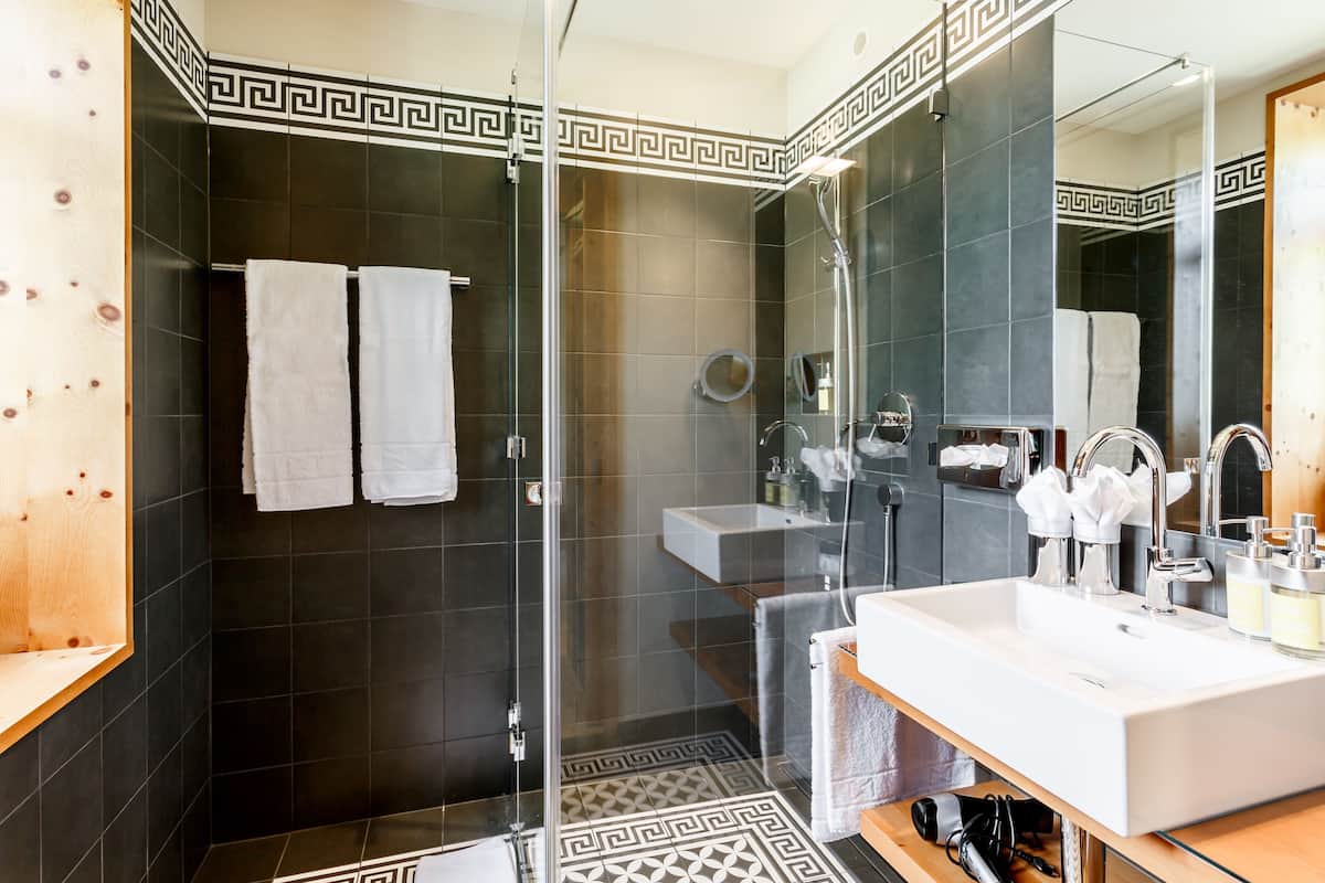 superior double room, balcony, mountain view | bathroom | free toiletries, hair dryer, bathrobes, slippers