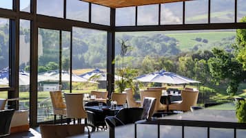 Breakfast, lunch served; international cuisine, garden views